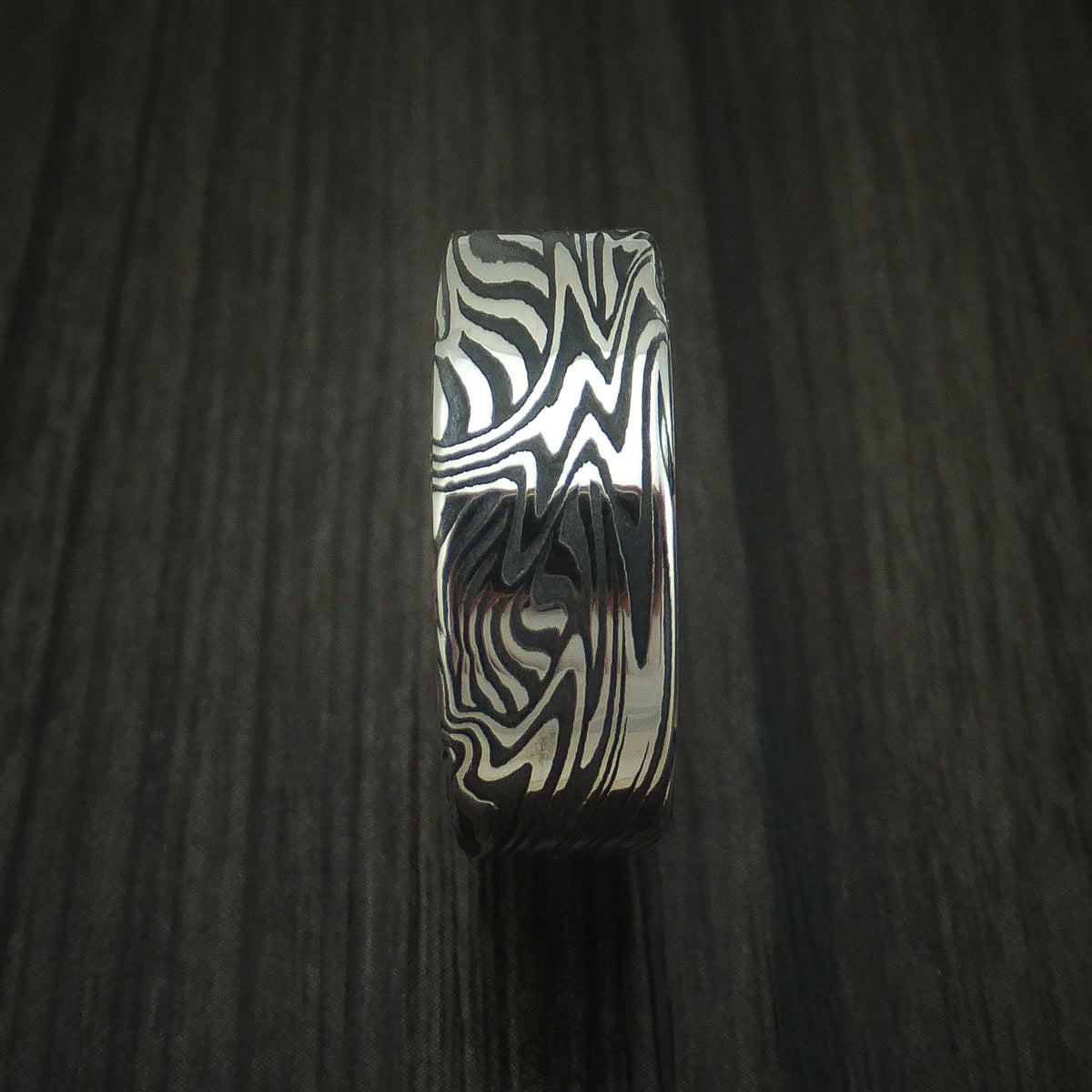 Sentinel XII - Sunset Kuro Damascus Steel Men's Wedding Ring with 14K Yellow Gold Sleeve - view 3 - Nura Lab