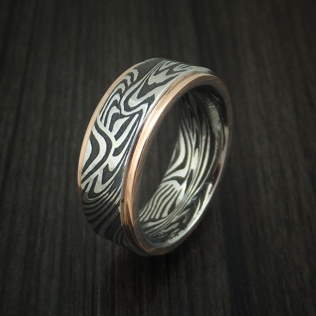 Albatross X - Sunset Kuro Damascus Steel Men's Wedding Ring with 14K Rose Gold Edges Band - view 4 - Nura Lab