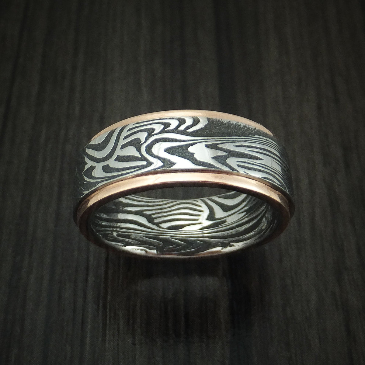 Albatross X - Sunset Kuro Damascus Steel Men's Wedding Ring with 14K Rose Gold Edges Band - view 2 - Nura Lab