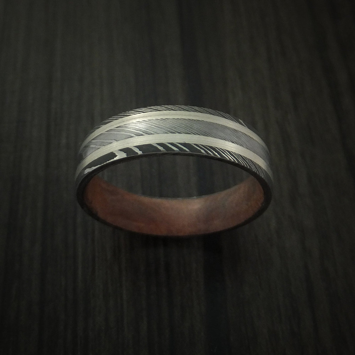 King Henry X - Damascus Steel Men's Wedding Ring with Silver Inlays and Hard Wood Sleeve - view 2 - Nura Lab