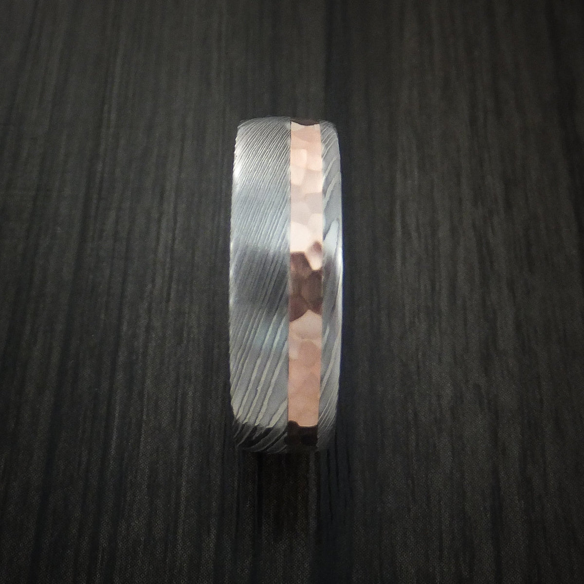 Midnight IX - Damascus Steel Men's Wedding Ring with 14K Rose Gold Hammered Inlay and Gold Sleeve Band - view 4 - Nura Lab