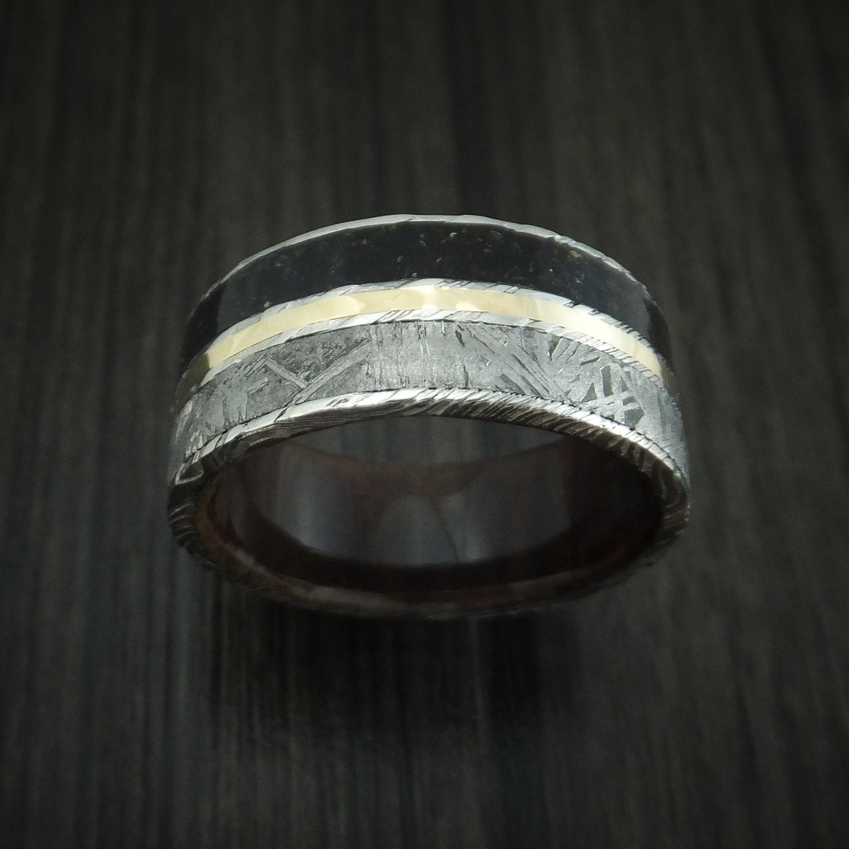 Southern Cross IX - Woodgrain Kuro Damascus Steel Black Dinosaur Bone and Gibeon Meteorite Men's Wedding Ring with Wood Sleeve and 14K Yellow Gold Inlay Fossil Band - view 2 - Nura Lab