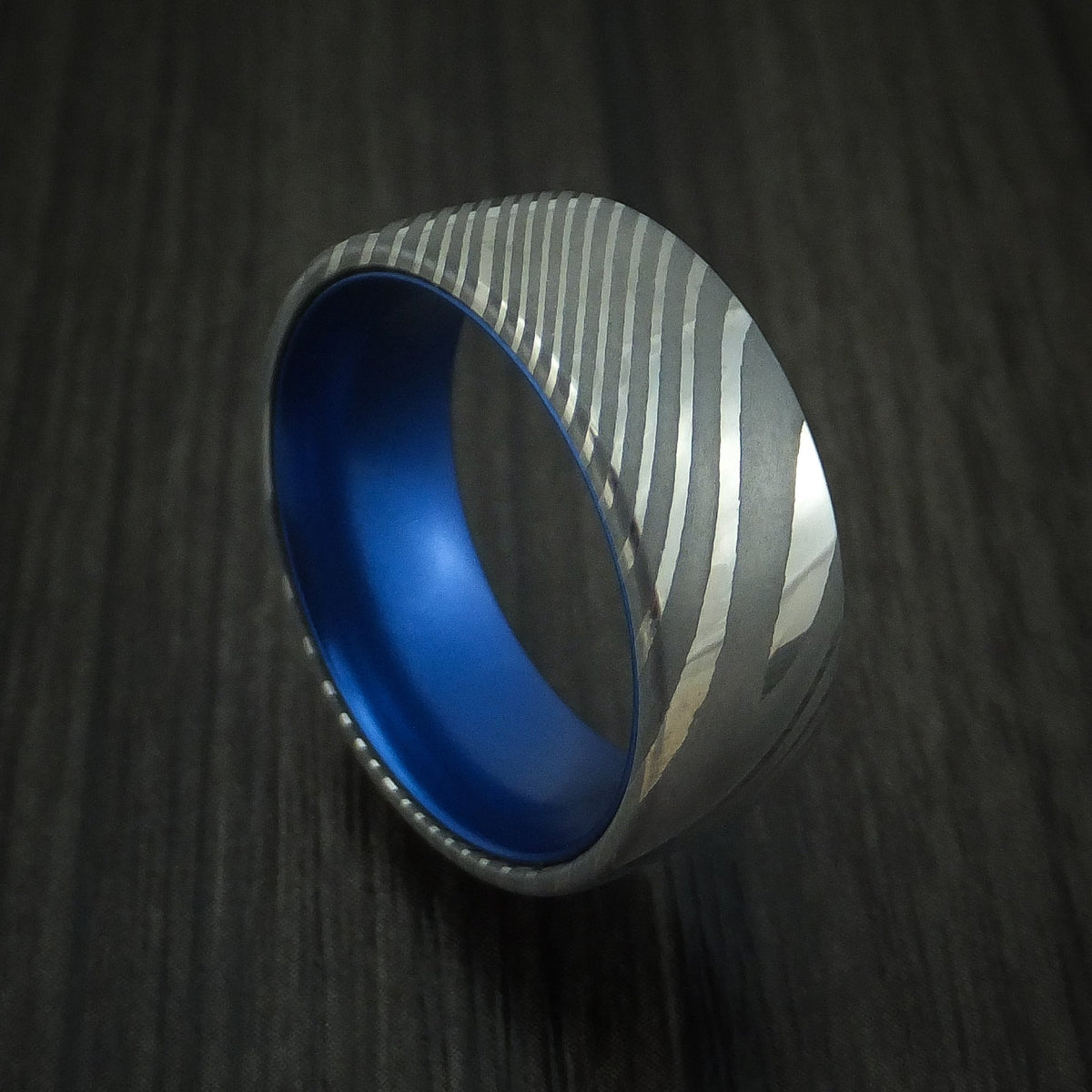 Tasman IX - Damascus Steel Men's Wedding Ring with Anodized Sleeve - Nura Lab