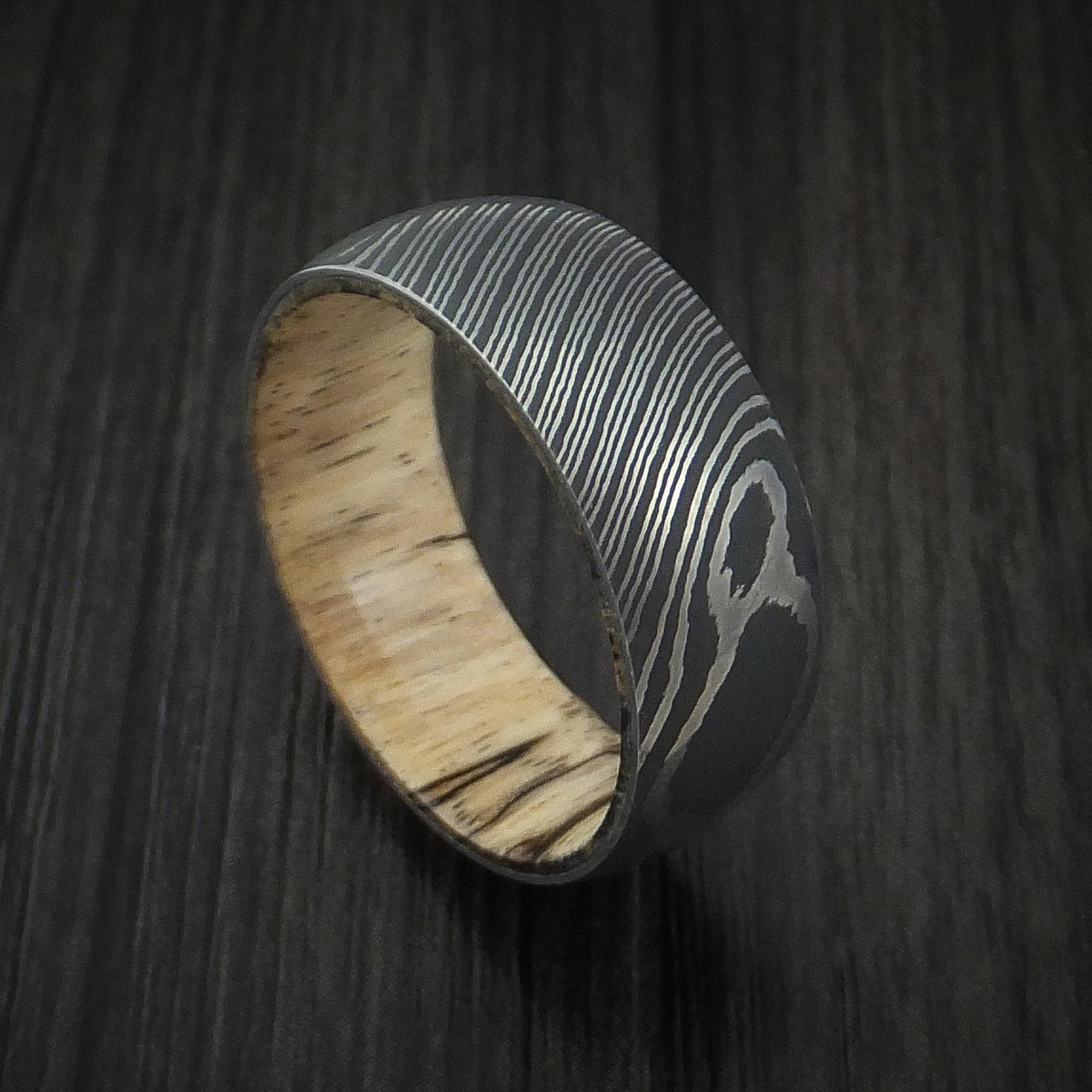Dominion X - Damascus Steel Men's Wedding Ring with Spalted Tamarind Hardwood Interior Sleeve - Nura Lab