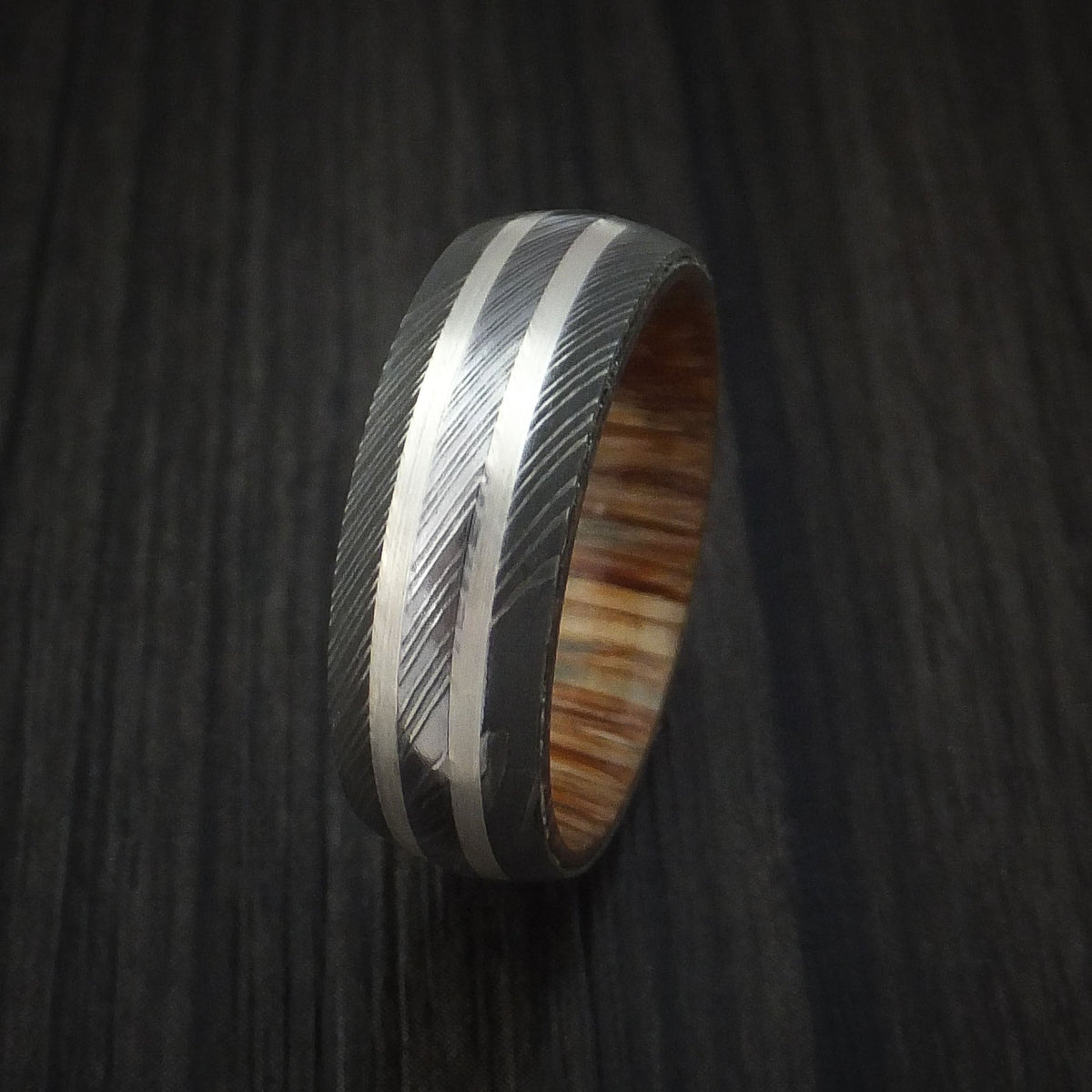 Southern Cross XI - Damascus Steel Men's Wedding Ring with Silver Inlays and Teak Hardwood Sleeve - view 4 - Nura Lab