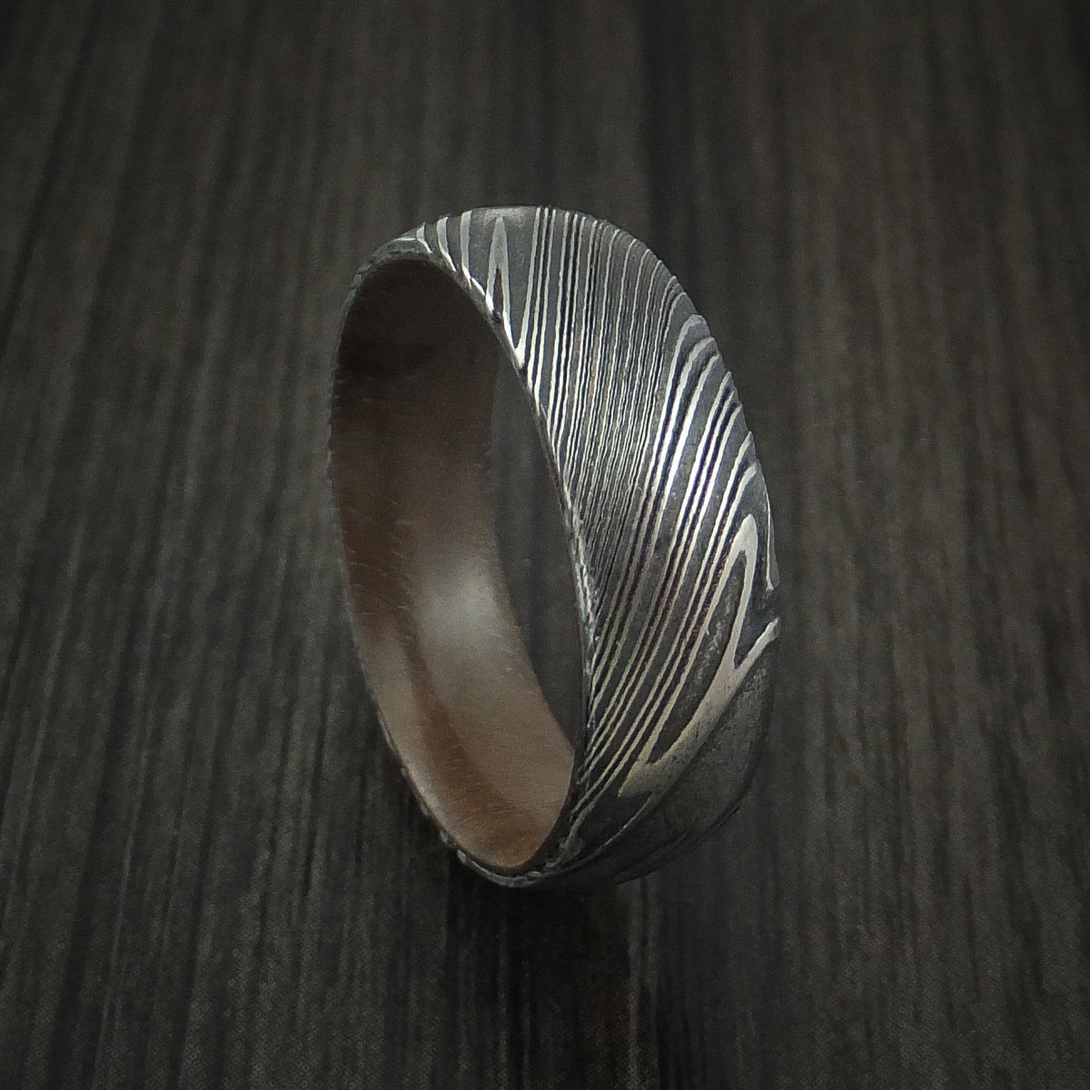 Wolf X - Woodgrain Kuro Damascus Steel Men's Wedding Ring with Walnut Hardwood Sleeve Wood Band - Nura Lab