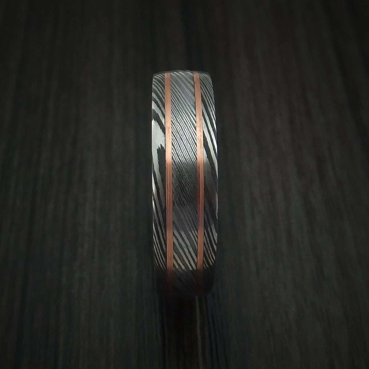 Northwind VIII - Damascus Steel Men's Wedding Ring with 14k Rose Gold Inlays and Hardwood Sleeve - view 3 - Nura Lab