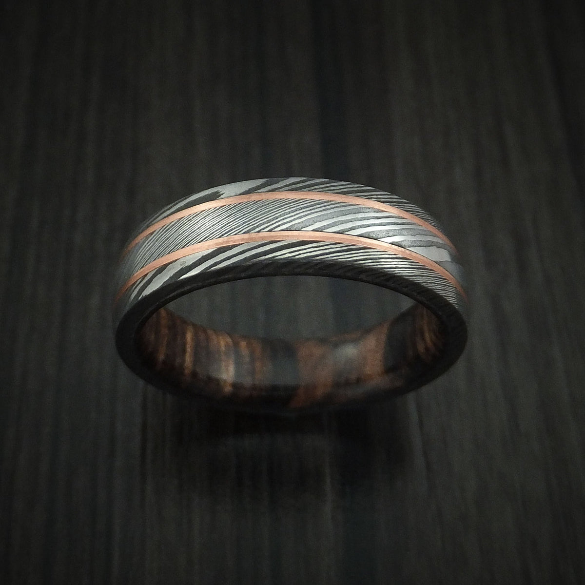 Northwind VIII - Damascus Steel Men's Wedding Ring with 14k Rose Gold Inlays and Hardwood Sleeve - view 2 - Nura Lab