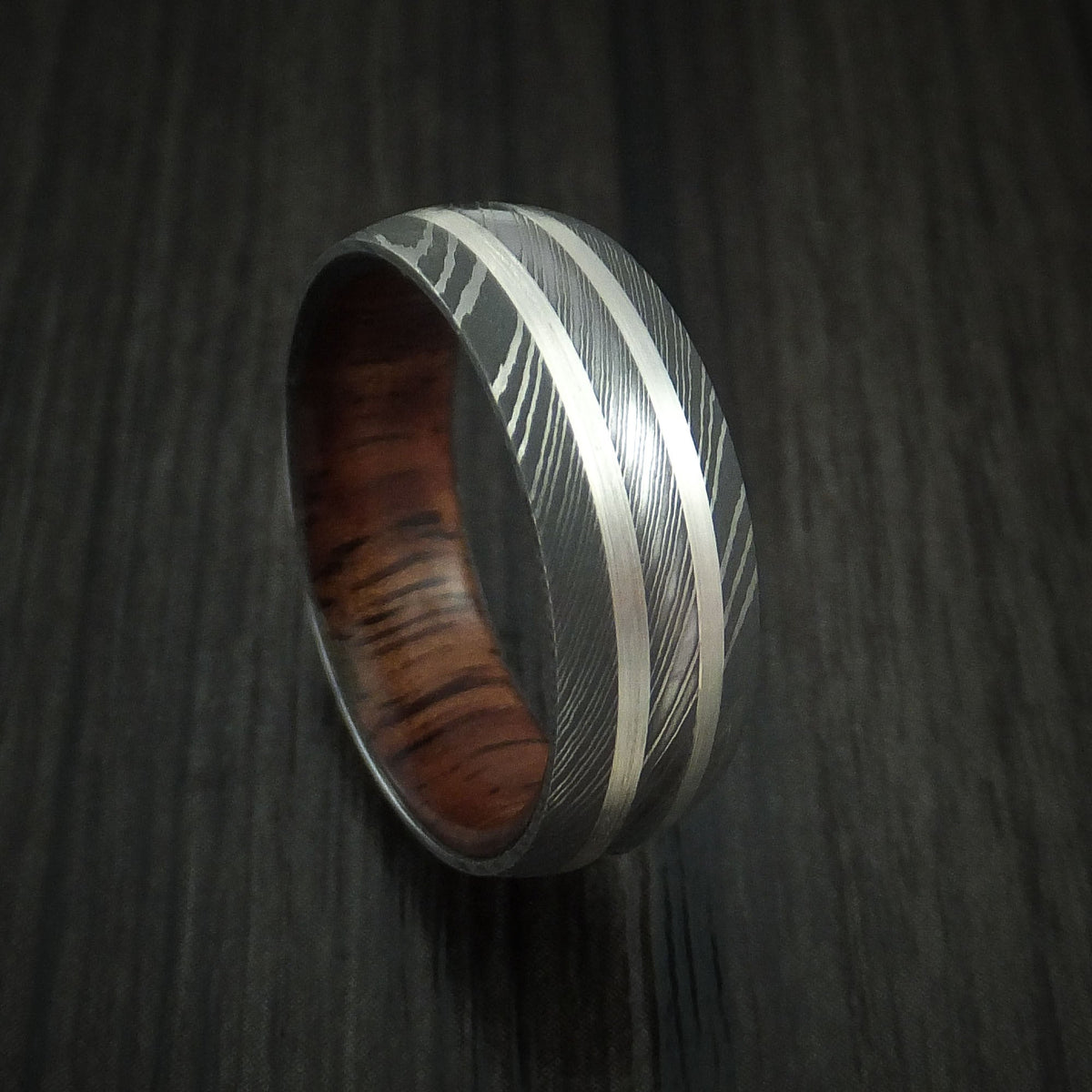 Kauri IX - Damascus Steel Men's Wedding Ring with Silver Inlays and Koa Hard Wood Sleeve - Nura Lab