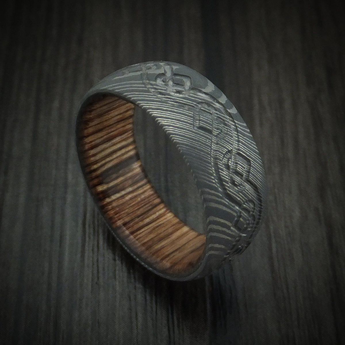 Harbour IX - Damascus Steel Men's Wedding Ring with Milled Celtic Heart Design and Interior Hardwood Sleeve Band - Nura Lab