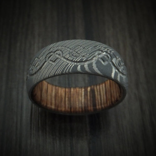 Harbour IX - Damascus Steel Men's Wedding Ring with Milled Celtic Heart Design and Interior Hardwood Sleeve Band - view 2 - Nura Lab