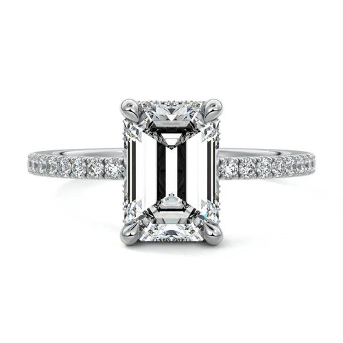 Emerald cut solitaire engagement ring with lab-grown moissanite diamond in 18K gold handmade in New Zealand by Nura Lab