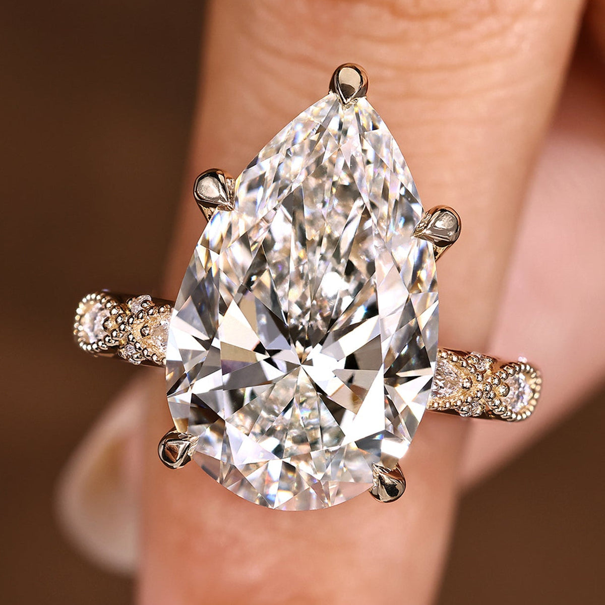 Elodie Grace - 10 Carat Pear Shaped Diamond Ring with Marquise and Round Pave