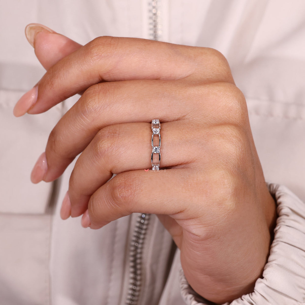 Handmade moissanite eternity band by Avideri.
