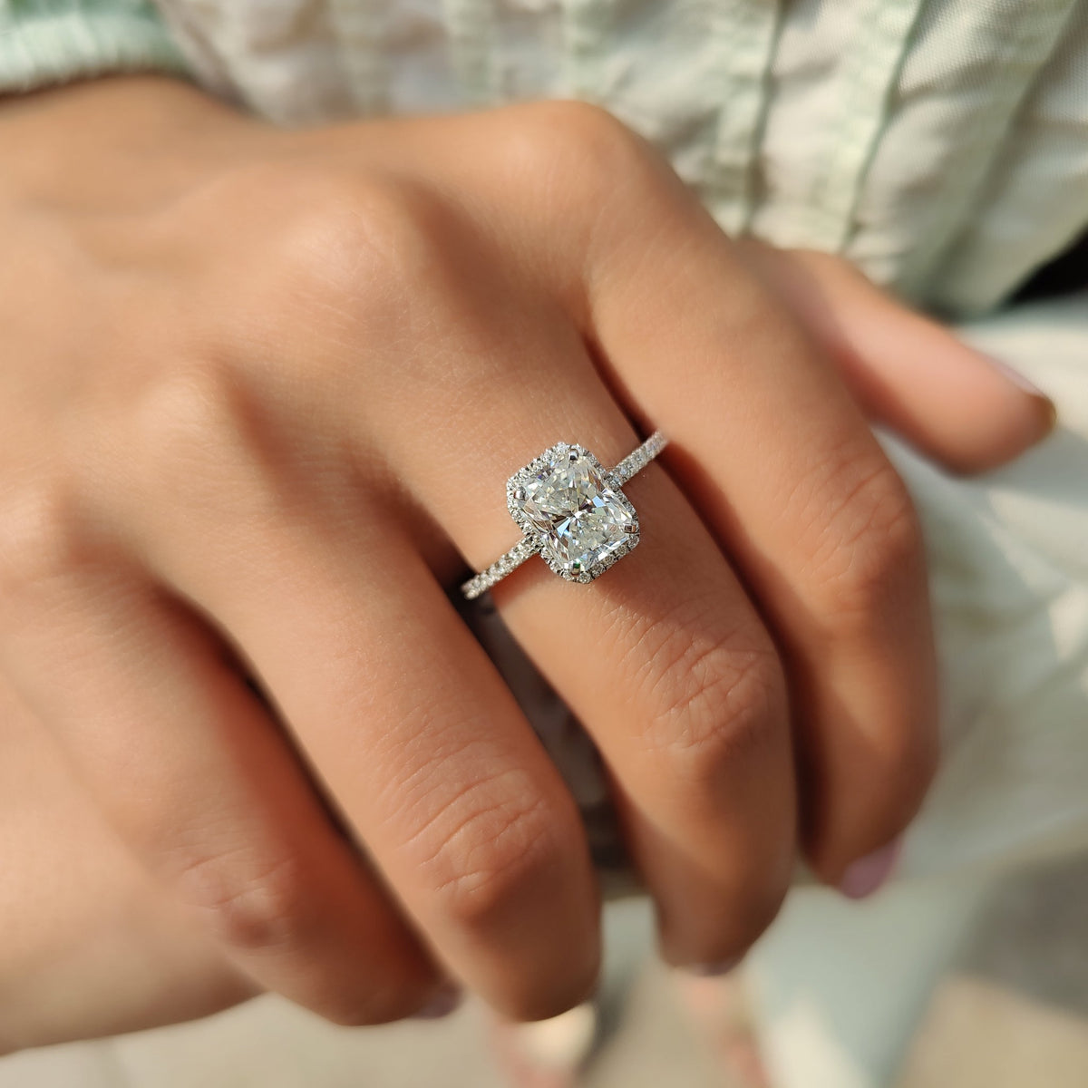 Rosamund Nell - Radiant Cut Moissanite Ring In Halo Style