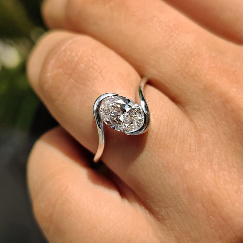 Cordelia Marie - Oval Diamond Engagement Ring In Half Bezel Setting