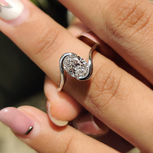 Cordelia Marie - Oval Diamond Engagement Ring In Half Bezel Setting