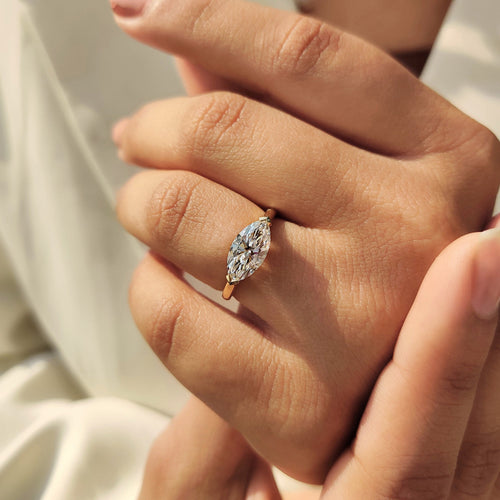 Amara Claire - East To West Marquise Ring In Solitaire Style