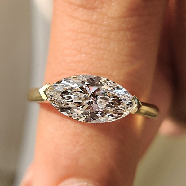 Amara Claire - East To West Marquise Ring In Solitaire Style
