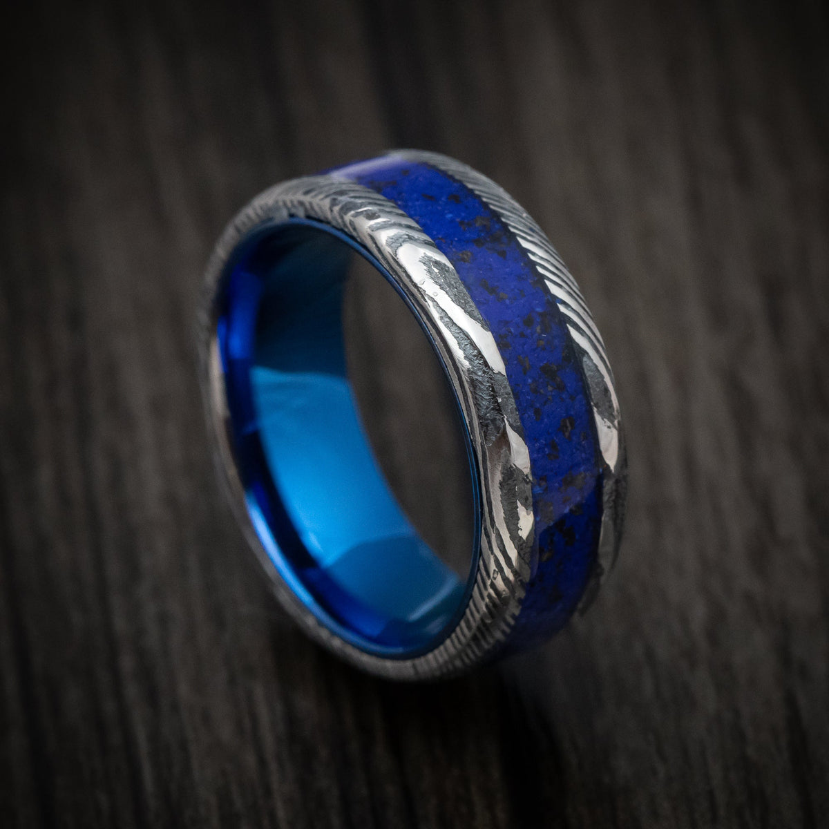 Ranger IX - Woodgrain Kuro Damascus Steel with Anodized Sleeve and Custom Dinosaur Bone and Stone Inlay Wedding Ring - Nura Lab