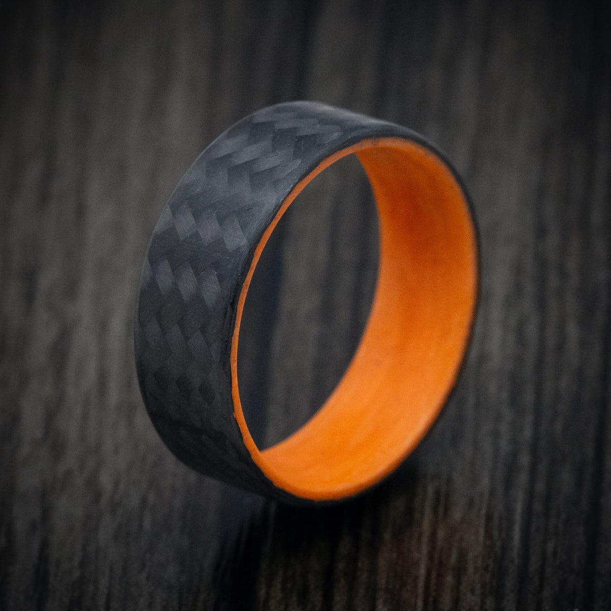 Evernorth XIV - Carbon Fiber Men's Wedding Ring with Orange Glow Sleeve - view 4 - Nura Lab