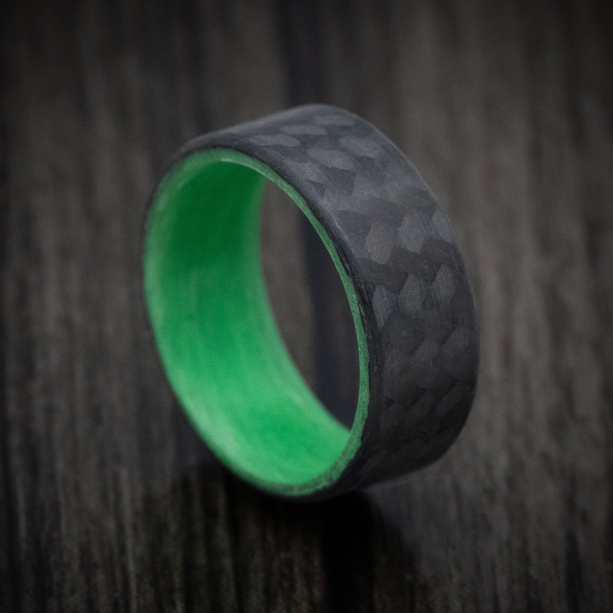 Crest XIV - Carbon Fiber Men's Wedding Ring with Green Glow Sleeve - Nura Lab