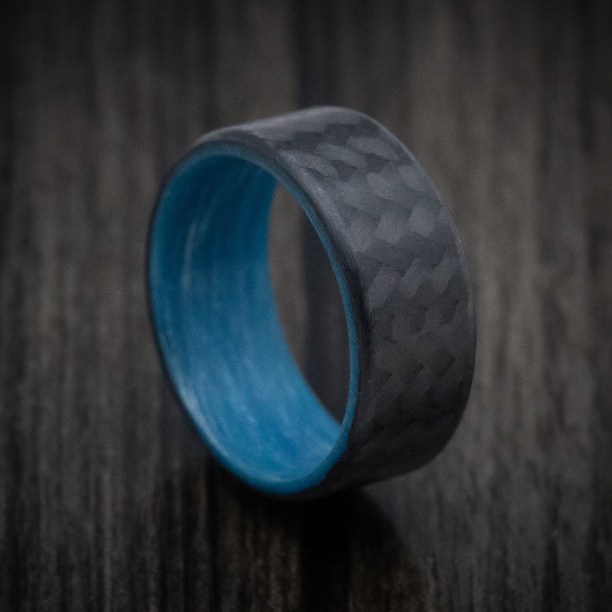Stonehaven XIV - Carbon Fiber Men's Wedding Ring with Blue Glow Sleeve - Nura Lab