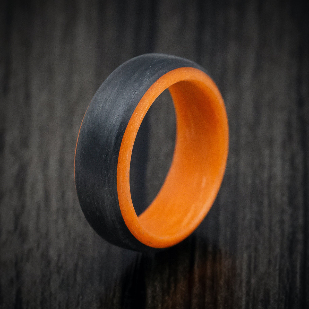 Onyx XIV - Carbon Fiber Men's Wedding Ring with Orange Glow Sleeve - view 4 - Nura Lab