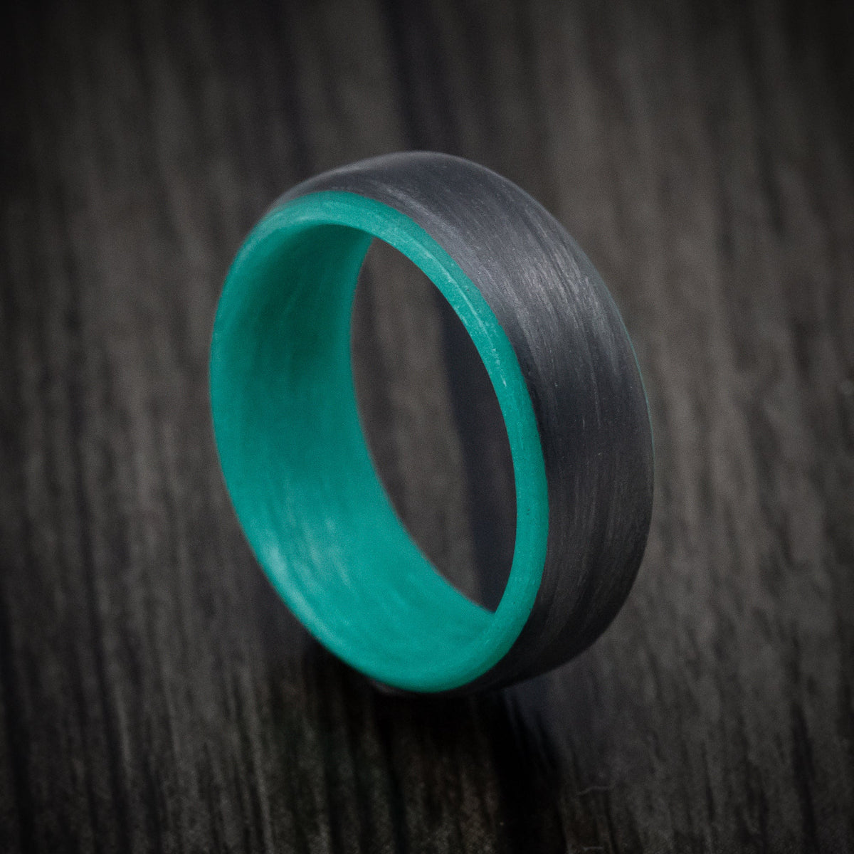 Nightfall XV - Carbon Fiber Men's Wedding Ring with Teal Glow Sleeve - Nura Lab