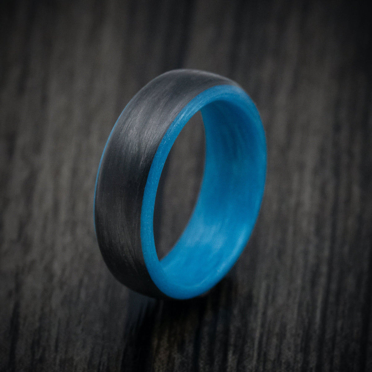 Rimu XIV - Carbon Fiber Men's Wedding Ring with Blue Glow Sleeve - view 4 - Nura Lab