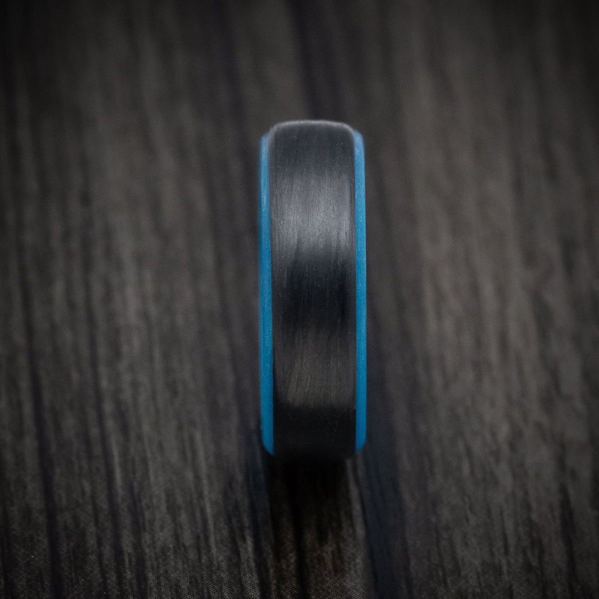 Rimu XIV - Carbon Fiber Men's Wedding Ring with Blue Glow Sleeve - view 3 - Nura Lab