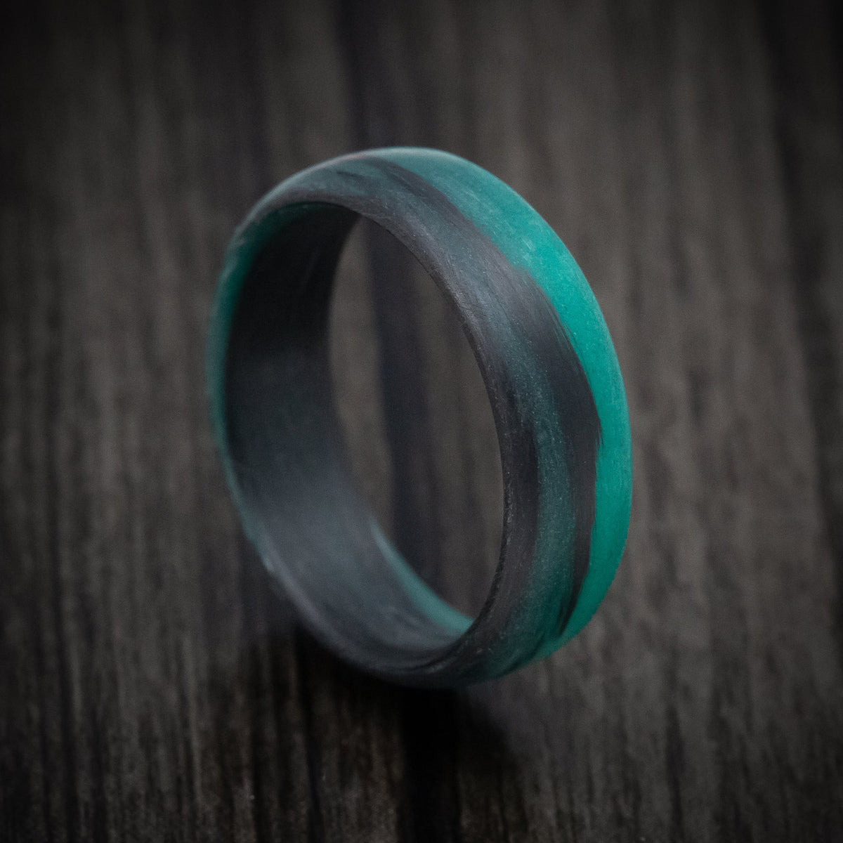 Kauri XIV - Carbon Fiber Men's Wedding Ring with Teal Glow Marbled Design - Nura Lab