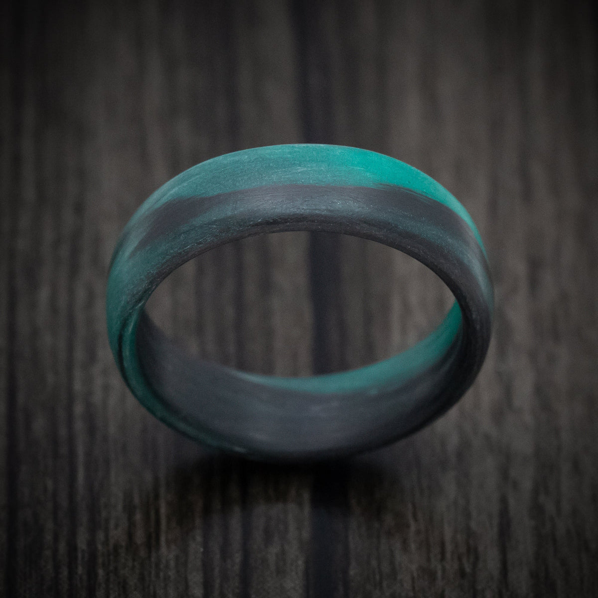 Kauri XIV - Carbon Fiber Men's Wedding Ring with Teal Glow Marbled Design - view 2 - Nura Lab