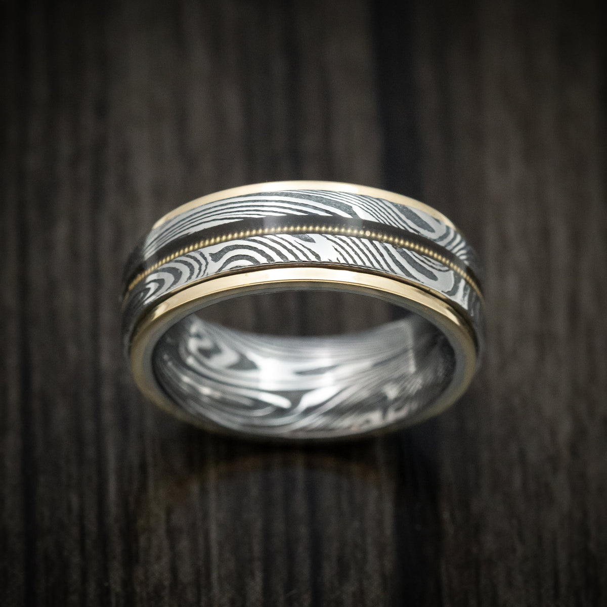 Augustus X - Sunset Kuro Damascus Steel and Guitar String Men's Wedding Ring with Gold Edges - view 2 - Nura Lab