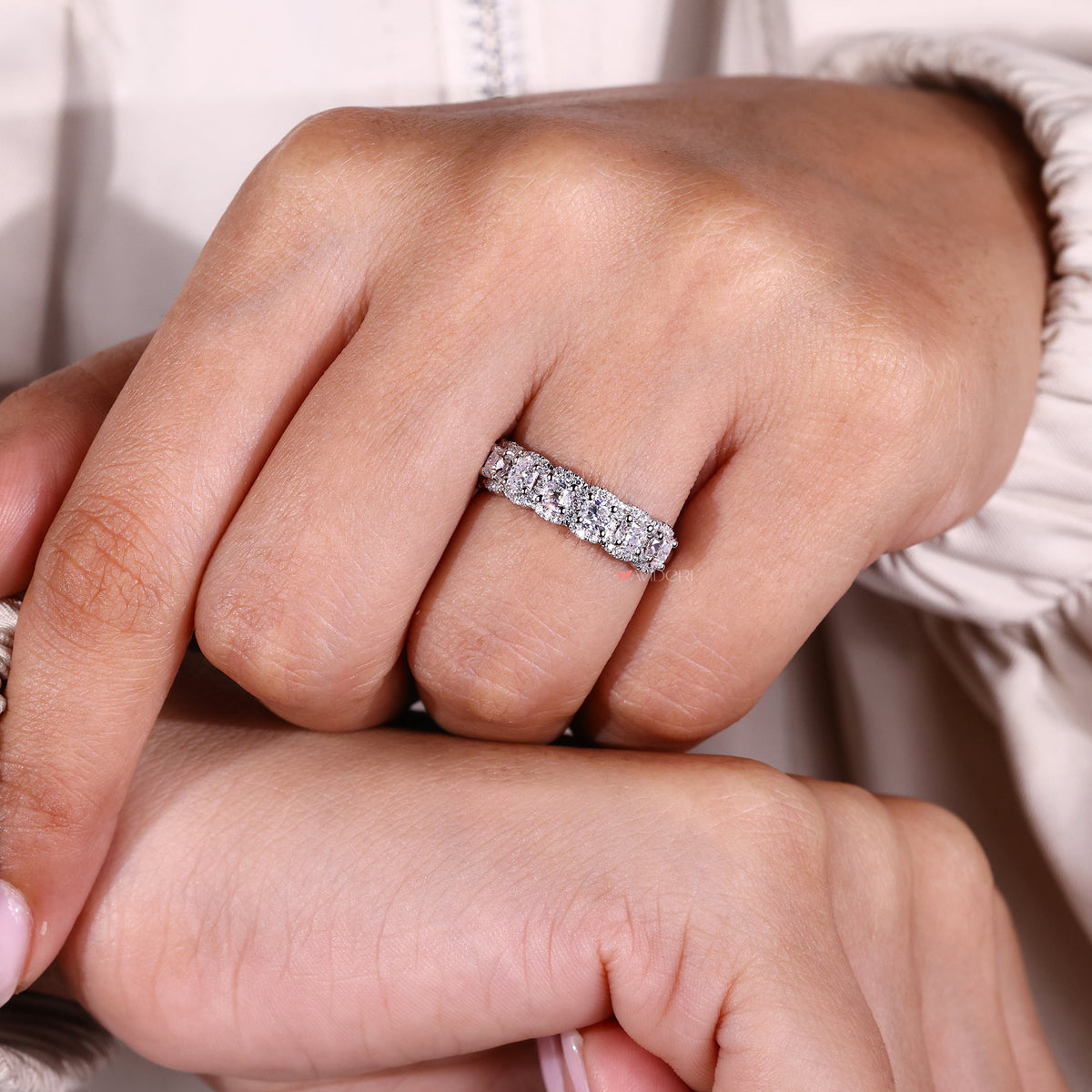 Avideri wedding band with a halo design.

