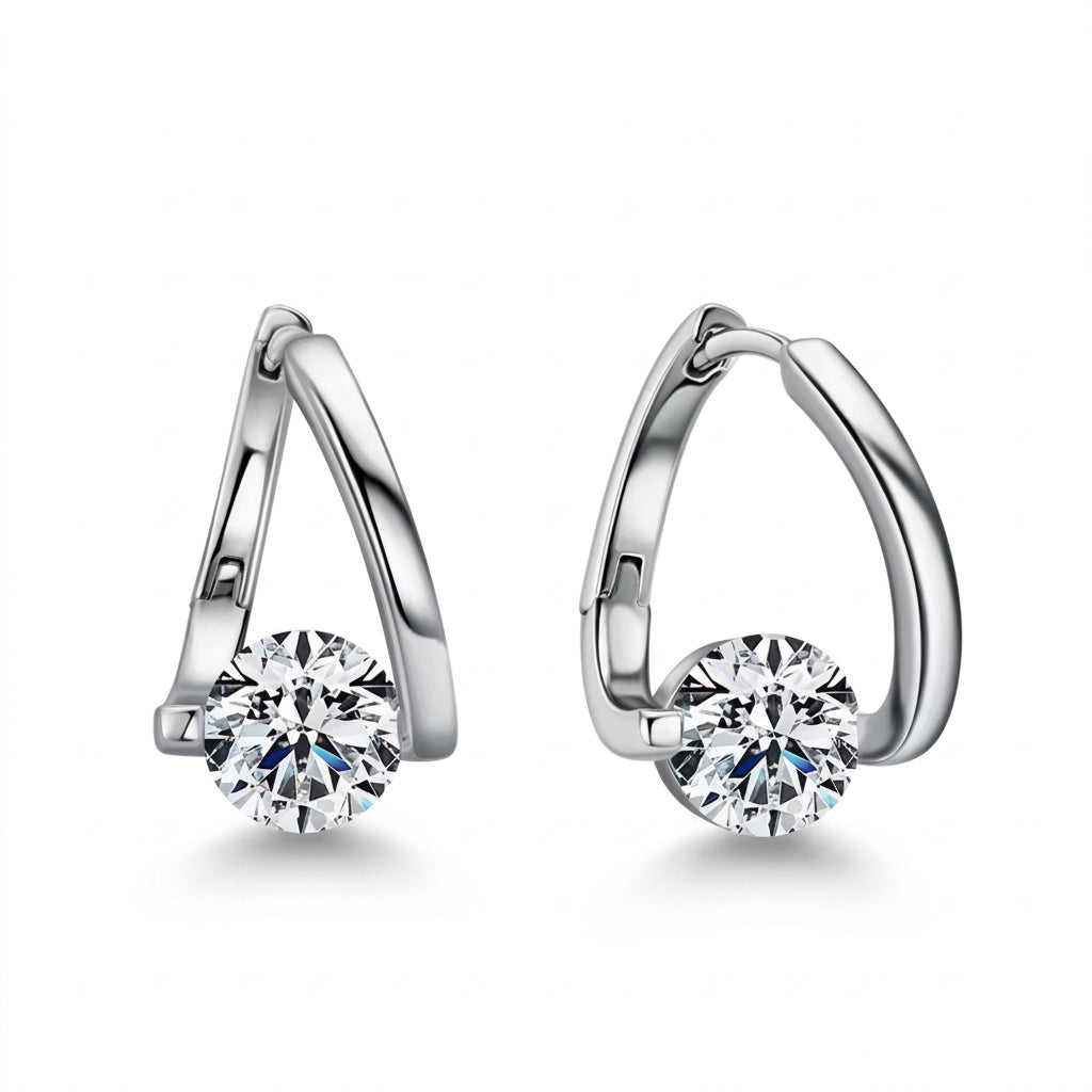 June Round-Cut Moissanite Earrings by Nura Lab in platinum plating over S925 sterling silver