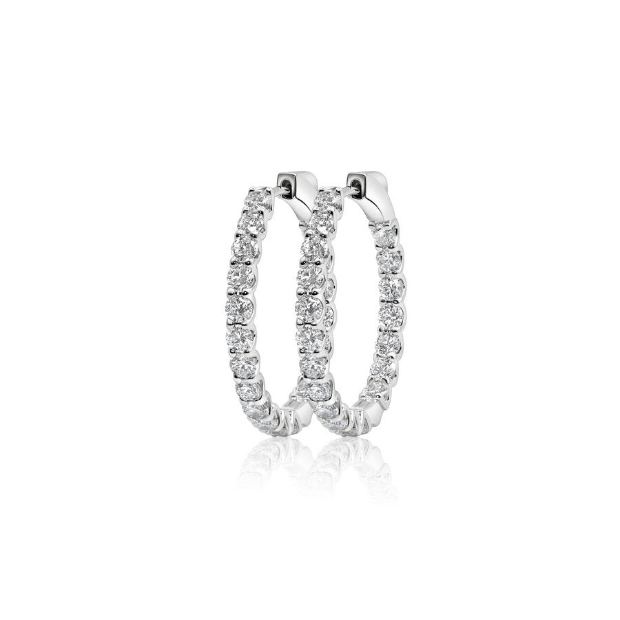 Side profile of 23.5 mm diamond huggie earrings showing hinged click clasp