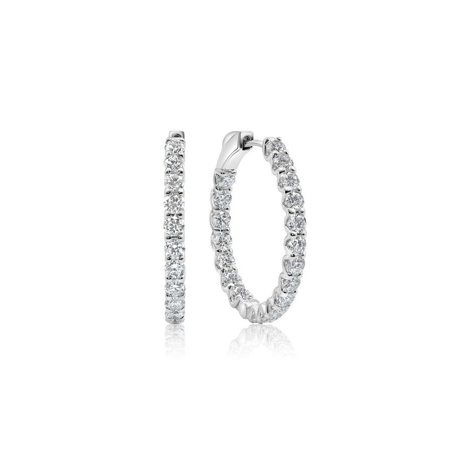 Side profile of 23.5 mm diamond huggie earrings showing hinged click clasp