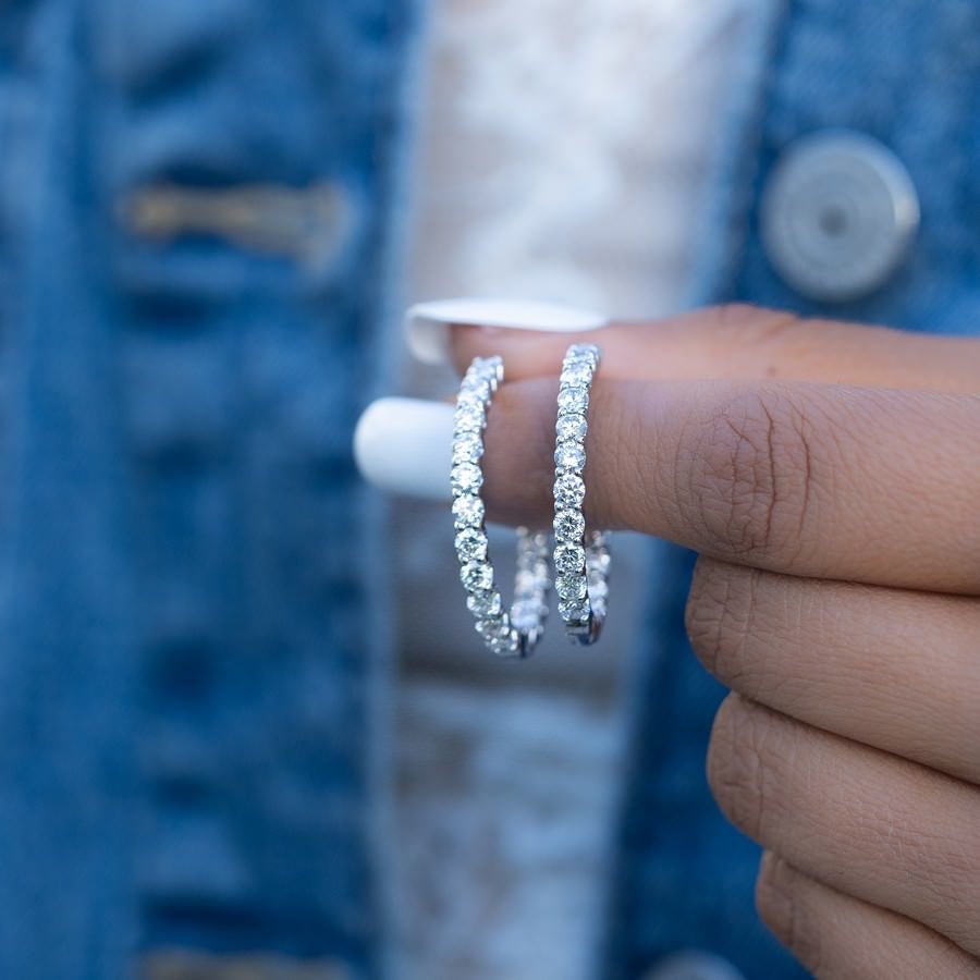 Close-up pavé setting F-G SI lab-grown diamonds on 14K white gold huggies