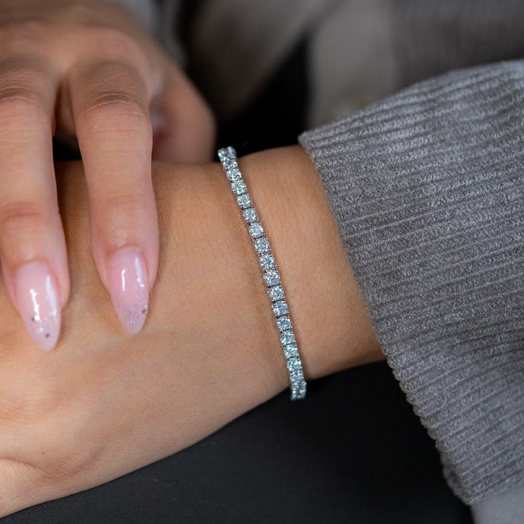 Side profile of lab-grown diamond line bracelet showing prongs