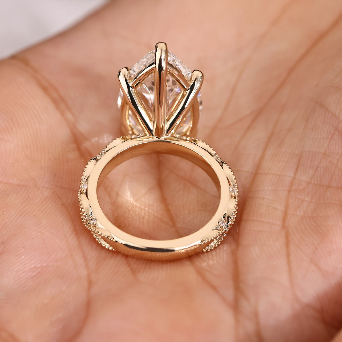 Elodie Grace - 10 Carat Pear Shaped Diamond Ring with Marquise and Round Pave