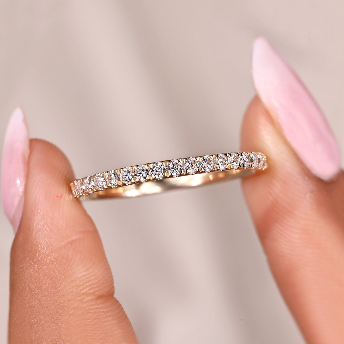 Moissanite wedding band shines with long-lasting brilliance and ethical value.