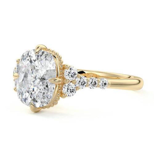 Celeste cushion cluster side stone lab grown diamond engagement ring in yellow gold