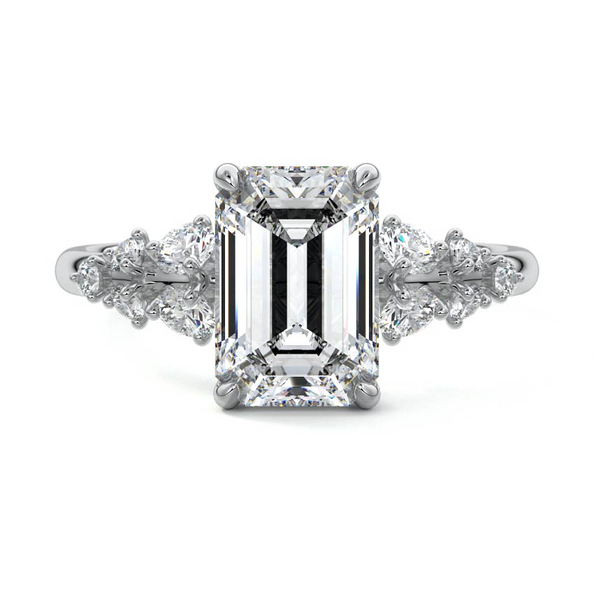 Delia emerald cut floral side stone lab grown diamond engagement ring in platinum