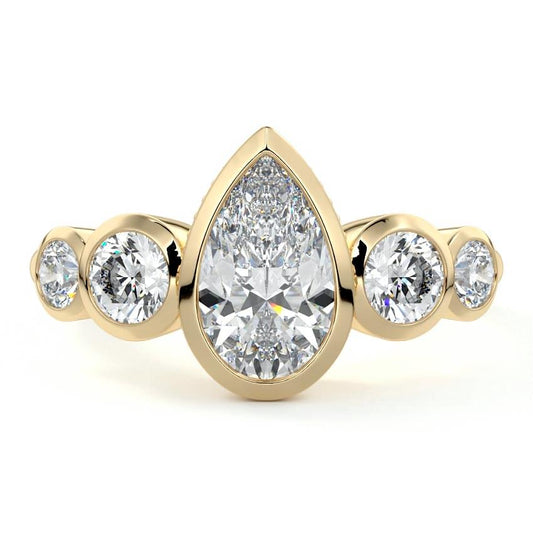 Evelina pear bezel side stone lab grown diamond engagement ring in yellow gold