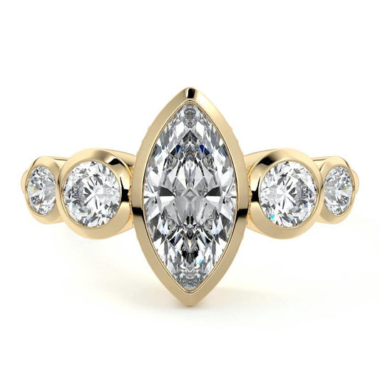 Evelina marquise bezel side stone lab grown diamond engagement ring in yellow gold