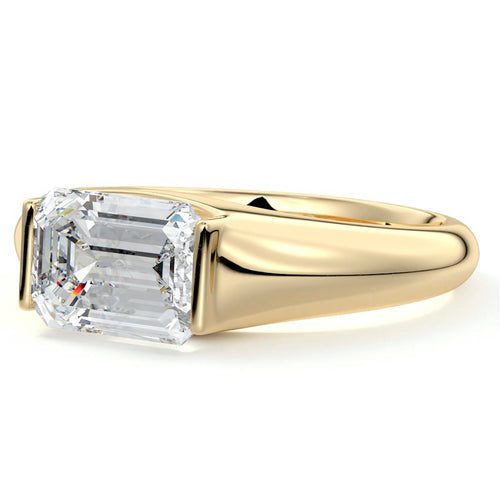 Katia east-west emerald cut bezel-inspired solitaire lab grown diamond engagement ring in yellow gold