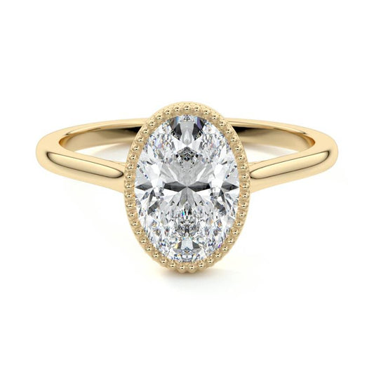 Marcella oval milgrain bezel solitaire lab grown diamond engagement ring in yellow gold
