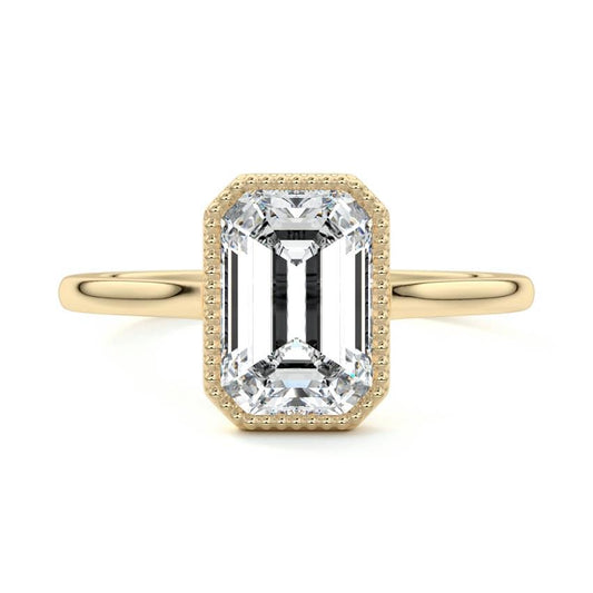 Marcella emerald cut milgrain bezel solitaire lab grown diamond engagement ring in yellow gold