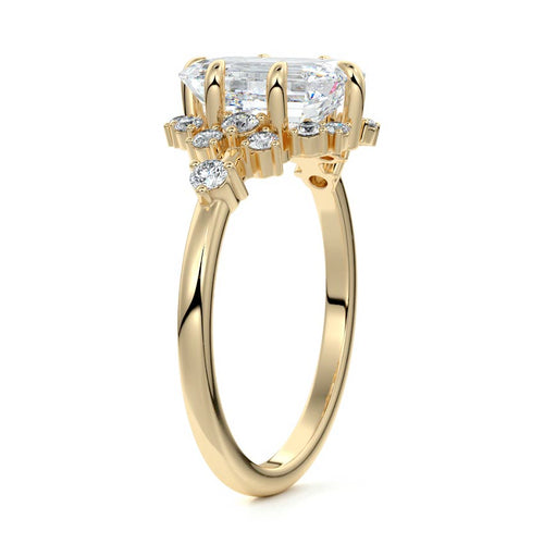Marina emerald cut floral side stone lab grown diamond engagement ring in yellow gold